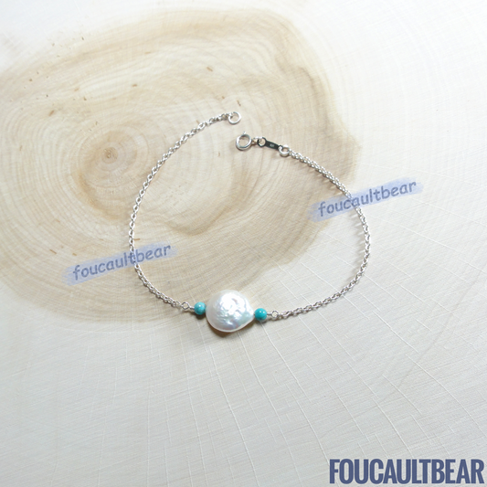 Foucaultbear's HANDCRAFTED BRACELET. Freshwater Coin Pearl (11-12mm) & Natural Turquoise Gemstones. All 925 Sterling Silver Components. Custom Lengths Available. Versatile 925 Sterling Silver 11-12mm Freshwater Coin Pearl and Natural Earth-Mined Turquoise bracelet adds simplicity yet exudes subtle elegance to your wardrobe. Can be worn on casual days and holds up well for dressed-up evenings. Perfect gift for your wedding party or bridesmaids too. 