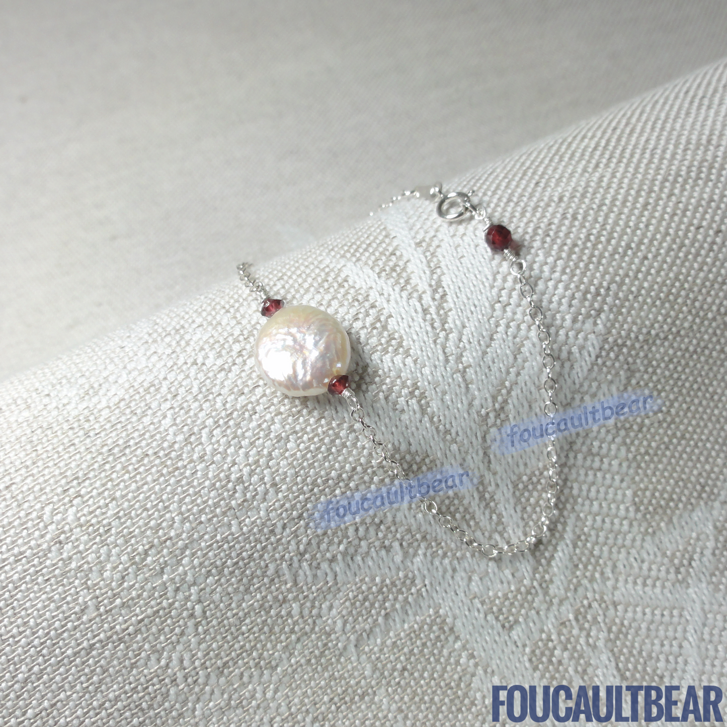 Foucaultbear's HANDCRAFTED BRACELET. Natural Freshwater Coin Pearl & Natural Red Garnets. All 925 Sterling Silver Components. Custom Lengths Available. This 925 Sterling Silver 11-12mm Natural Freshwater Coin Pearl and Natural Earth-Mined Red Garnets Bracelet makes for a great daily wardrobe staple. Makes for a wonderful wedding party or bridesmaid gift too. This freshwater coin pearl has natural striations, iridescent rainbow hues showing its unique characteristics.