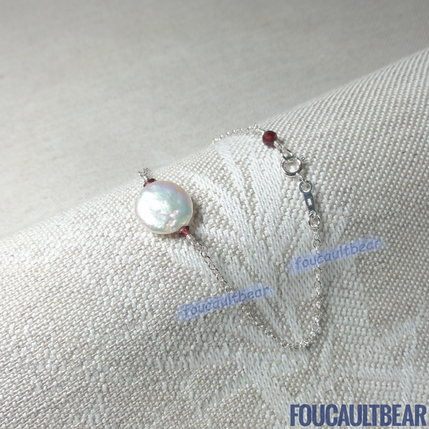 Foucaultbear's HANDCRAFTED BRACELET. Natural Freshwater Coin Pearl & Natural Red Garnets. All 925 Sterling Silver Components. Custom Lengths Available. This 925 Sterling Silver 11-12mm Natural Freshwater Coin Pearl and Natural Earth-Mined Red Garnets Bracelet makes for a great daily wardrobe staple. Makes for a wonderful wedding party or bridesmaid gift too. This freshwater coin pearl has natural striations, iridescent rainbow hues showing its unique characteristics.