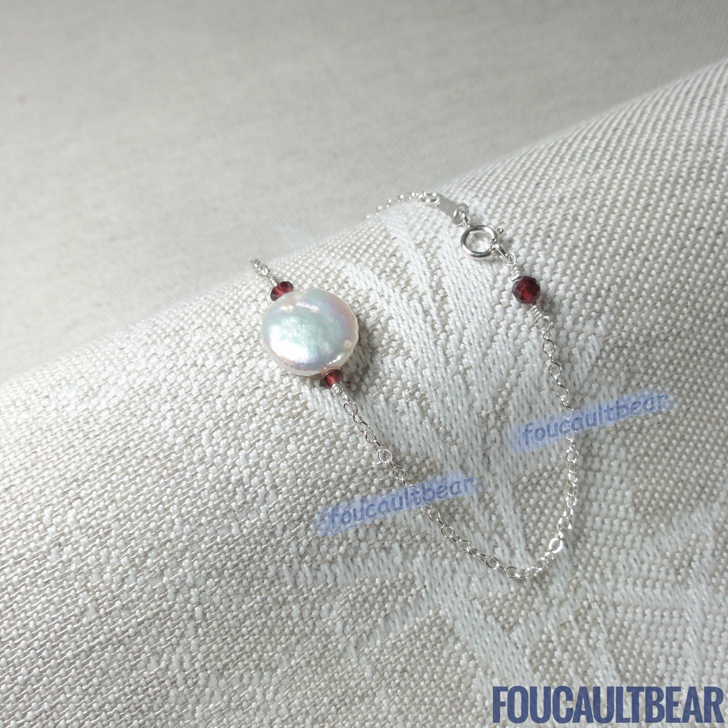 Foucaultbear's HANDCRAFTED BRACELET. Natural Freshwater Coin Pearl & Natural Red Garnets. All 925 Sterling Silver Components. Custom Lengths Available. This 925 Sterling Silver 11-12mm Natural Freshwater Coin Pearl and Natural Earth-Mined Red Garnets Bracelet makes for a great daily wardrobe staple. Makes for a wonderful wedding party or bridesmaid gift too. This freshwater coin pearl has natural striations, iridescent rainbow hues showing its unique characteristics.