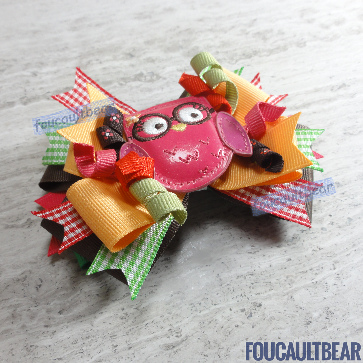 Foucaultbear's HANDMADE MULTI-LAYERED HAIR BOW CLIP with CENTERPIECE. Large Fall Homecoming Brainy Owl with Glasses. Soft Patent Centerpiece. Grosgrain Ribbon Bow. French Barrette Hair Clip For Ponytail or Pigtails. M2MG. Adorable Soft Big Bespectacled Owl is perfect for toddlers, preschoolers, kindergartners, elementary or even middle-schoolers for the coming Autumn and Thanksgiving. Can be worn year round too for owl lovers! Very versatile in my opinion. 
