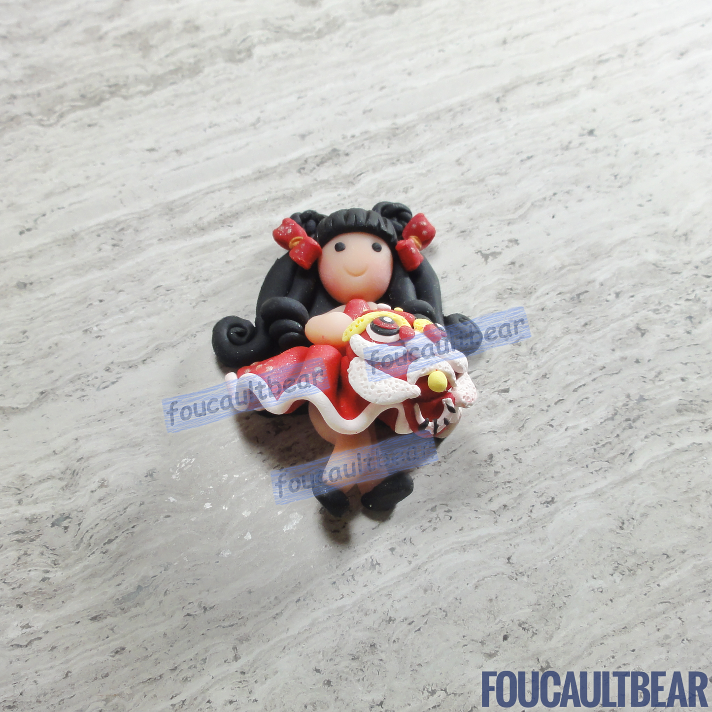 Foucaultbear's HANDMADE CLAY ART FLATBACK. Lunar Chinese New Year Girl (Black Hair) with Lion (Medium). Handmade Polymer Clay Art. For Your Own Creative Use, such as on Hair Bow Barrette Clips, Picture Frames and Refrigerator Magnets. This medium sized flatback clay Lunar Chinese New Year Girl (Black Hair) with Lion looks good as a hair centerpiece. Great for any of your art projects, too.