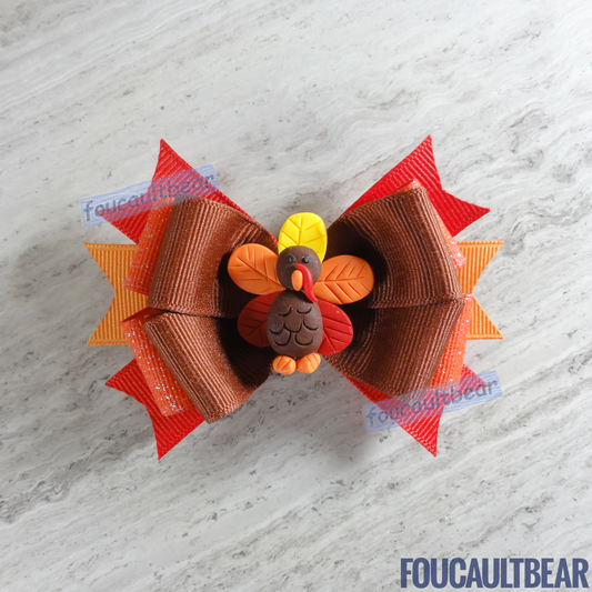 Foucaultbear's HANDMADE MULTI-LAYERED HAIR BOW CLIP with CLAY CENTERPIECE. Clay Harvest Turkey. Handmade Polymer Clay Centerpiece. Grosgrain Ribbon. French Barrette Hair Clip for Ponytail or Pigtails. Adorable Fall Harvest Turkey centerpiece hair bow barrette is perfect for toddlers, preschoolers, kindergartners, elementary or even middle-schoolers for the coming Thanksgiving & Christmas holiday seasons. Can be worn any time of the year should you wish to take out the turkey. Why not? 