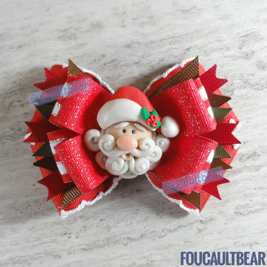 Foucaultbear's HANDMADE MULTI-LAYERED HAIR BOW CLIP with CLAY CENTERPIECE. Jolly Santa Claus with White Trim. Handmade Polymer Clay Centerpiece. Grosgrain Ribbon. French Barrette Hair Bow for Ponytail & Pigtails. Jolly Father Santa Claus with White Trim centerpiece adorns this hair bow barrette. Perfect for toddlers, preschoolers, kindergartners, elementary or even middle-schoolers for the coming Christmas holiday season. Looks great on adults too! 