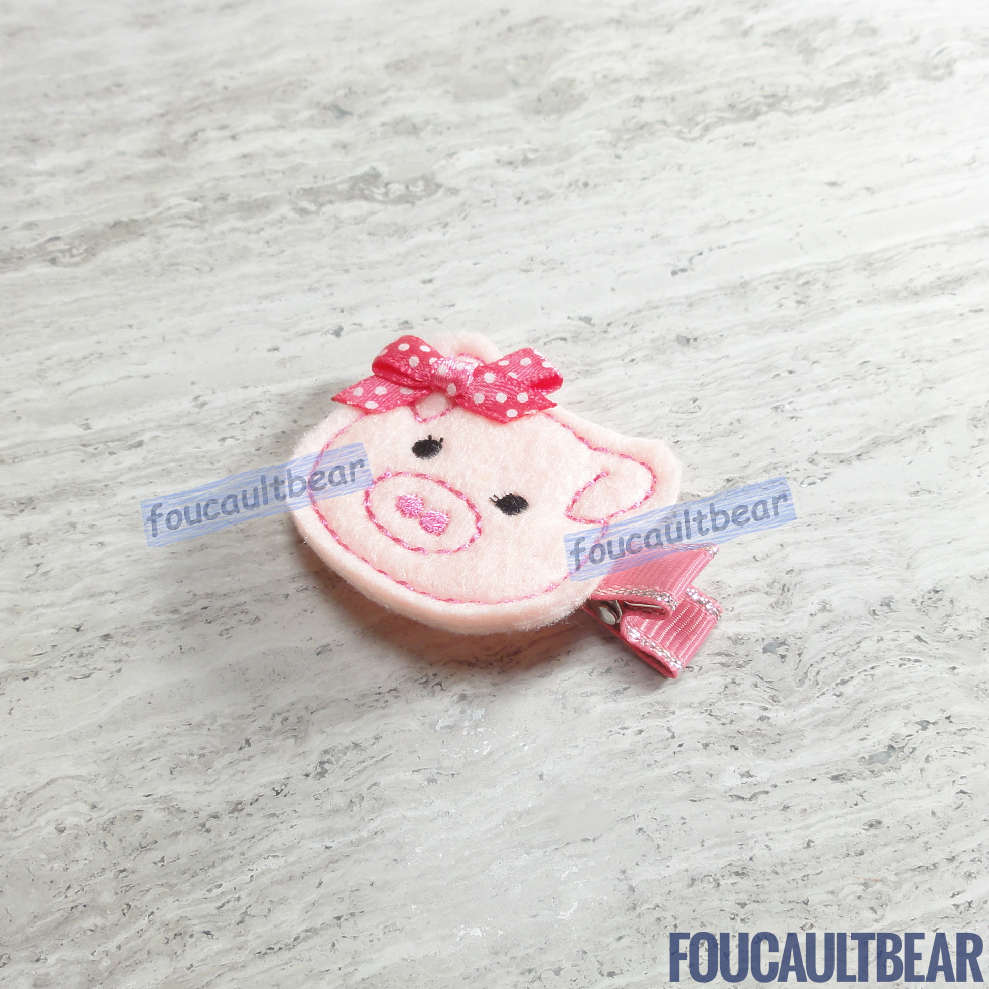 Foucaultbear's HANDMADE HAIR CLIPPIE. Little Pink Mrs. Pig/ Miss Piggy. Embroidered Soft Felt. Partially Lined Alligator Hair Clip. Super Pink Piggy Hair Clippie. A nice addition to your little girl's wardrobe for Easter and whenever baby chicks are in style! Absolutely adorable on babies with enough hair to wear it too. Approximately 1 3/4 inches (4.5 cm) across. Attached with a 1 3/4 inch (4.5 cm) partially lined alligator clip.