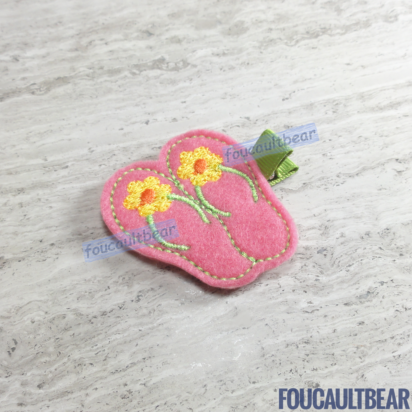 Foucaultbear's HANDMADE HAIR CLIPPIE. Summer Flip-Flops. Embroidered Soft Felt Centerpiece. Partially Lined Alligator Hair Clip. Summer Flip-Flop Thong Sandals Hair Clippie. Perfect for toddlers, preschoolers, elementary-schoolers. Absolutely adorable on babies with enough hair to wear it too. Makes for a great baby Shower gift. Definitely not your standard cliché shower gift. 