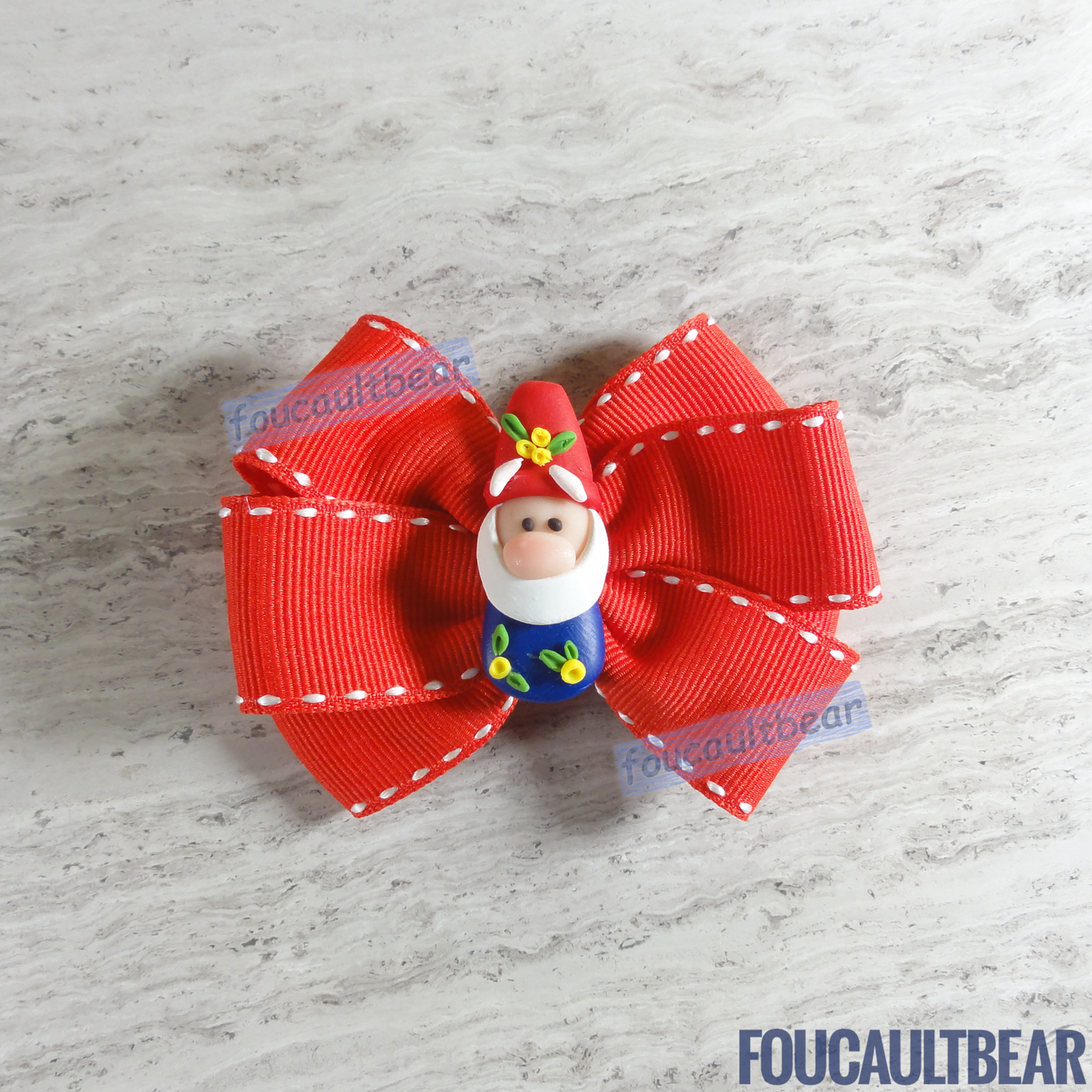 Foucaultbear's HANDMADE MULTI-LAYERED HAIR BOW CLIP with CLAY CENTERPIECE. Garden Gnome in Festive Red & Blue. Handmade Polymer Clay Centerpiece. Grosgrain Ribbon. French Barrette Hair Bow for Ponytail & Pigtails. Adorable Garden/Holiday Gnome centerpiece adorns this hair bow barrette. Perfect for toddlers, preschoolers, kindergartners, elementary or even middle-schoolers for the coming holiday season. Suitable for year-round wearing too. 