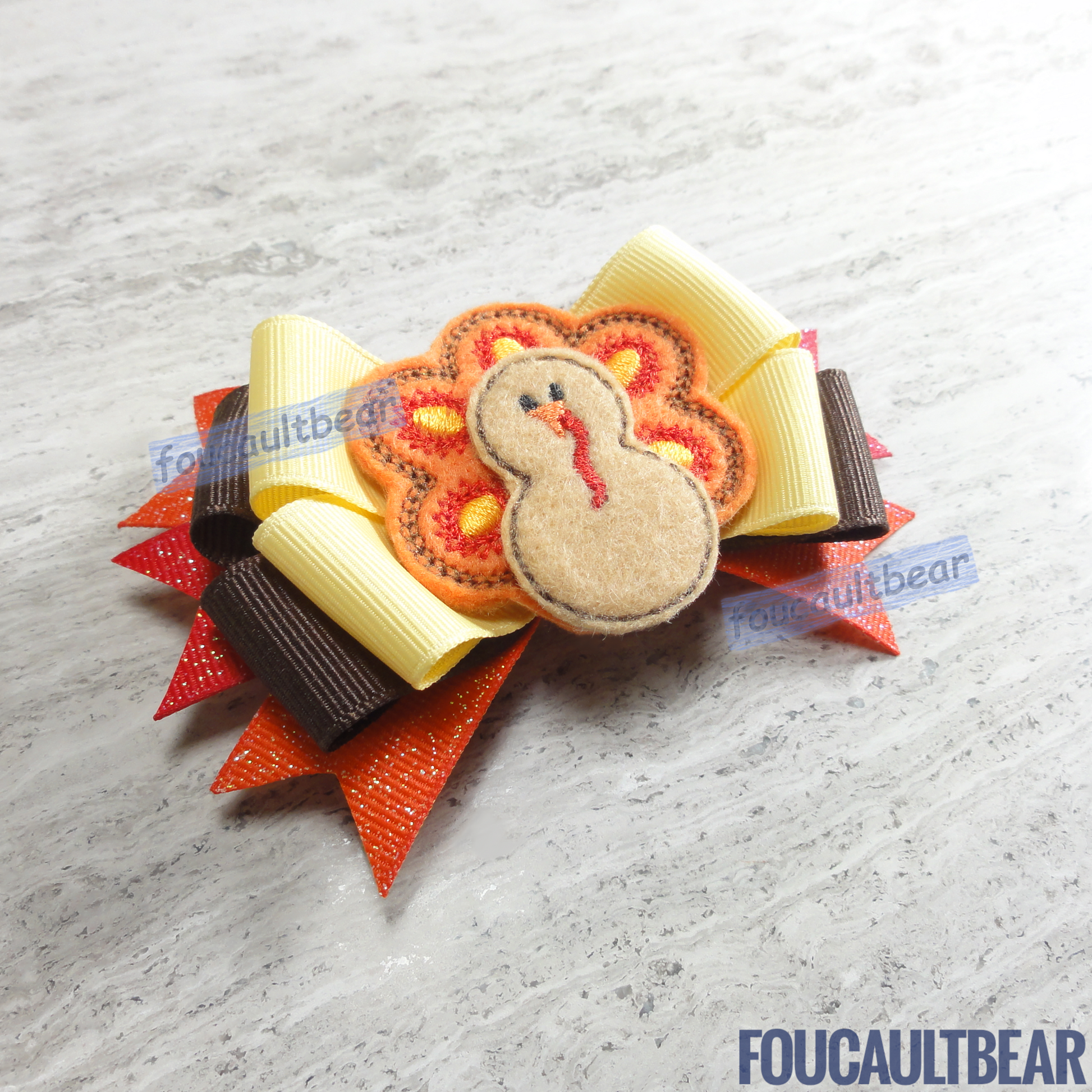 Foucaultbear's HANDMADE MULTI-LAYERED HAIR BOW BARRETTE CLIP with CENTERPIECE. Harvest Turkey. Embroidered Soft Felt Centerpiece. Grosgrain Ribbon Bow. French Barrette Hair Clip for Ponytail or Pigtails. Adorable Harvest Turkey is perfect for toddlers, preschoolers, kindergartners, elementary or even middle-schoolers for the coming Autumn and Thanksgiving. Perfect for Christmas and year round when turkeys are afoot! Very Versatile in my opinion. 